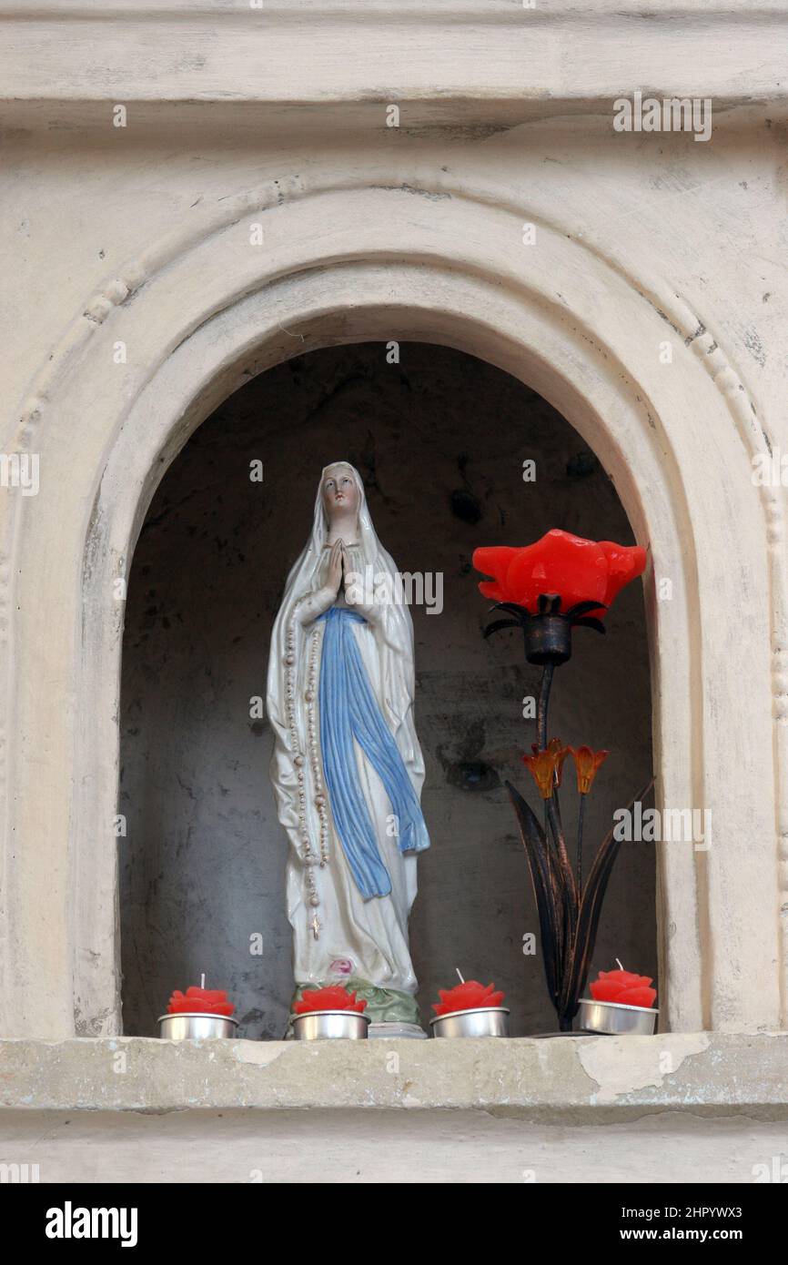 Our Lady of Lourdes, statue in the church of the Assumption of the Virgin Mary in Glogovnica, Croatia Stock Photo