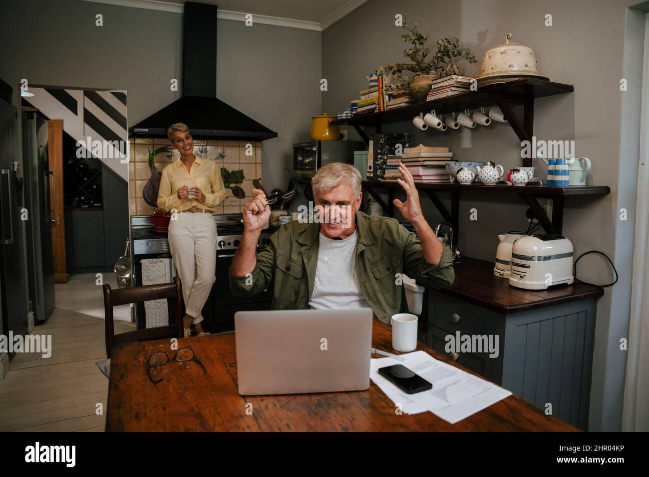 Excited couple in kitchen hi-res stock photography and images - Alamy