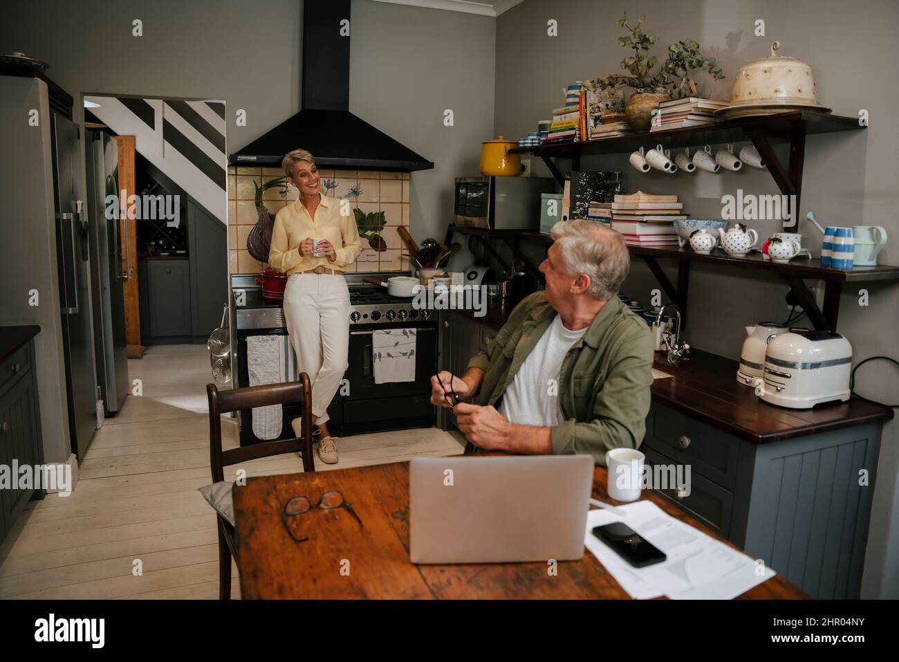 Excited couple in kitchen hi-res stock photography and images - Alamy