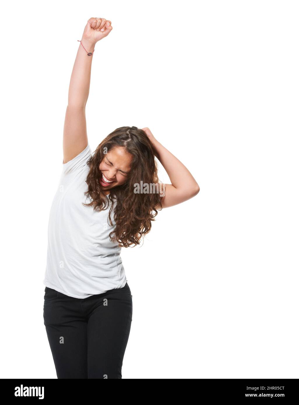 Shes positively casual. Studio shot of an all-natural woman isolated on white. Stock Photo