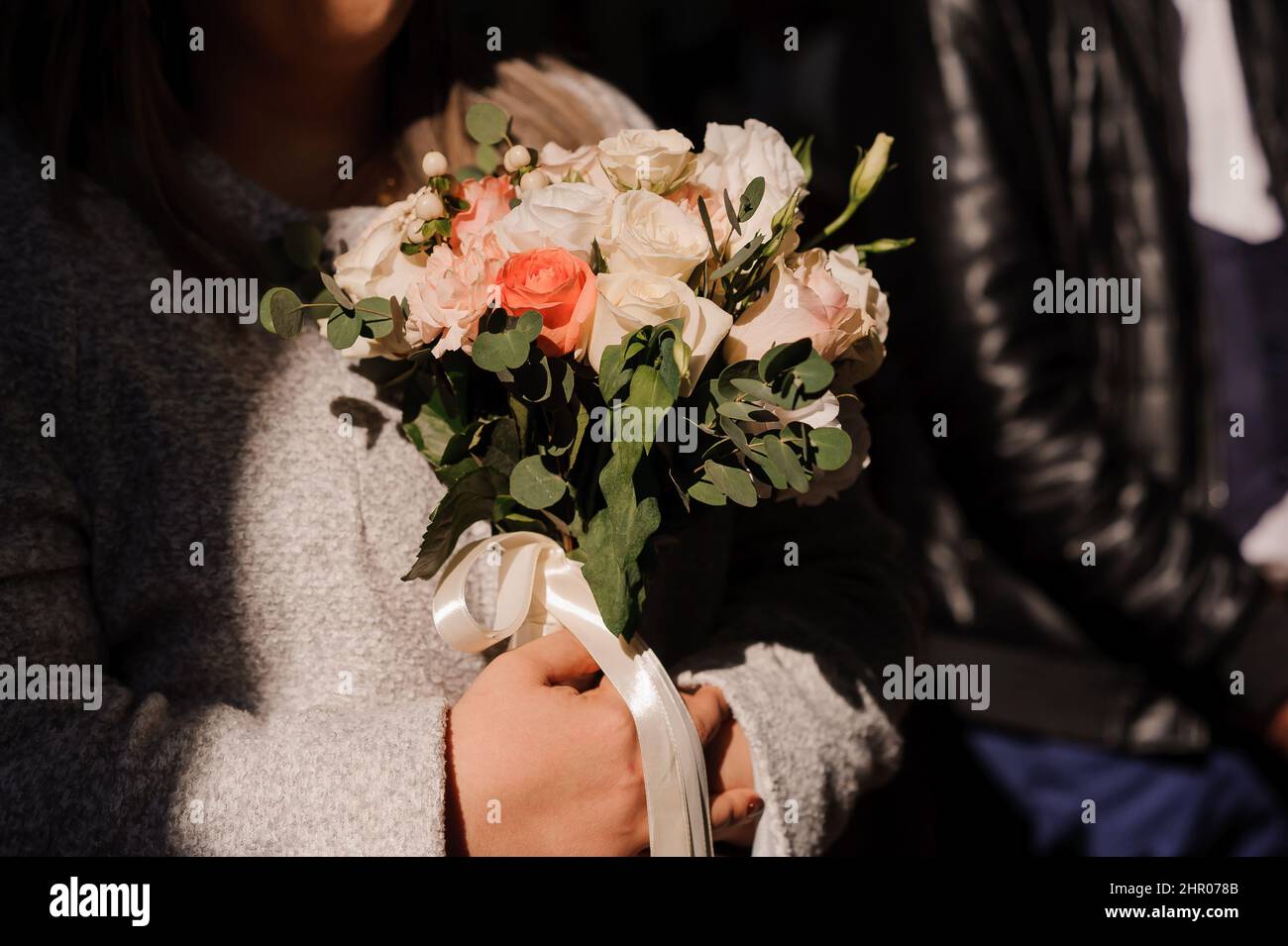 Bouquet of flowers in the bride's hand. Bridal bouquet Stock Photo