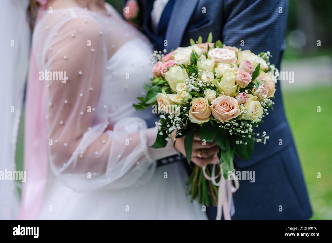 Bouquet of flowers in the bride's hand. Bridal bouquet Stock Photo - Alamy