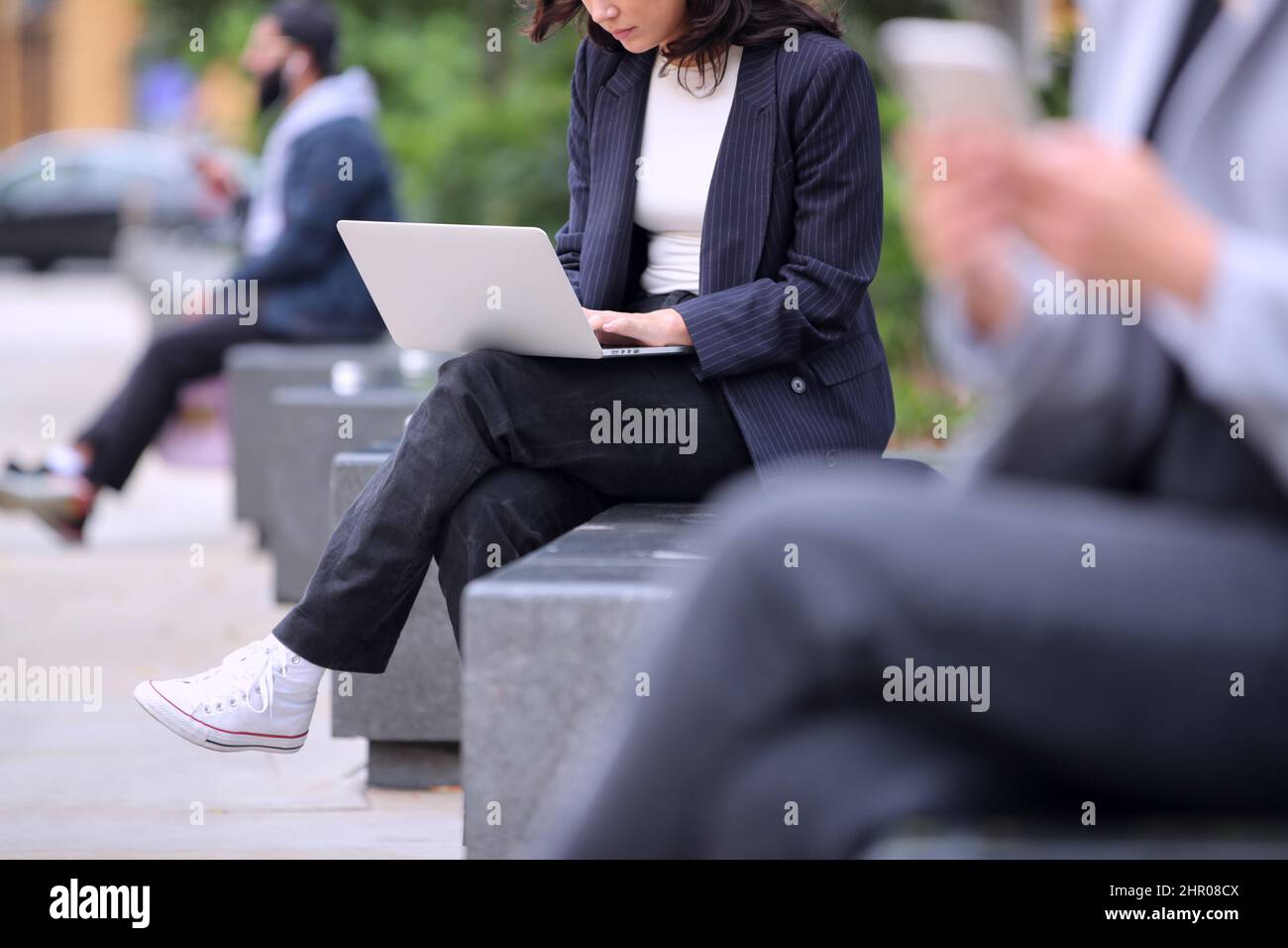 Close Up Of Businesswoman Outdoors Working On Laptop During Break From The Office Stock Photo