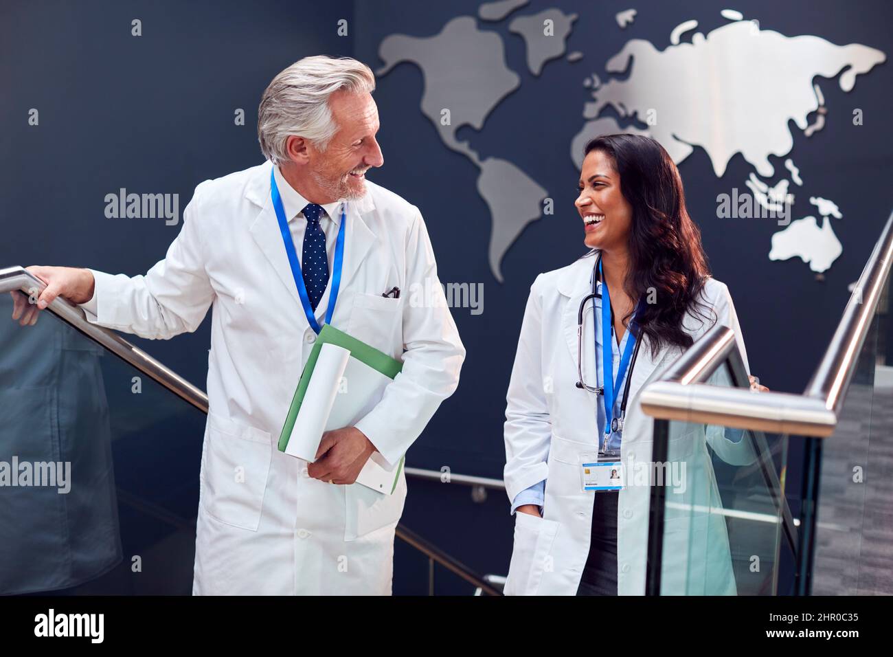 Wearing white lab coats hi-res stock photography and images - Alamy