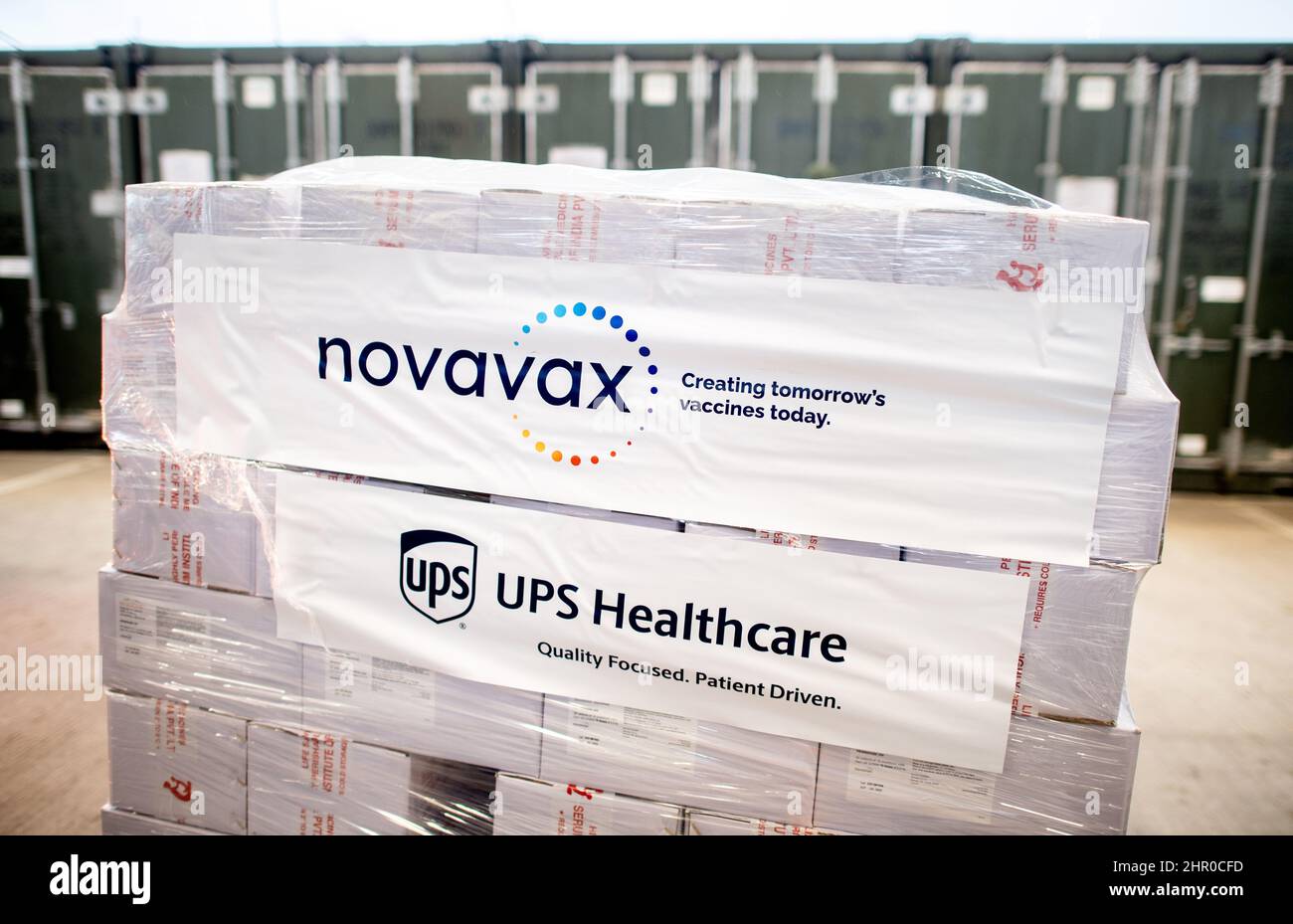 24 February 2022, Lower Saxony, Quakenbrück: The Corona vaccine Nuvaxovid from Novavax is delivered to the premises of the Bundeswehr pharmacy and temporarily stored in refrigerated containers. The barracks in Quakenbrück, Lower Saxony, serve as the central vaccine warehouse in Germany during the Corona crisis. Photo: Hauke-Christian Dittrich/dpa Stock Photo