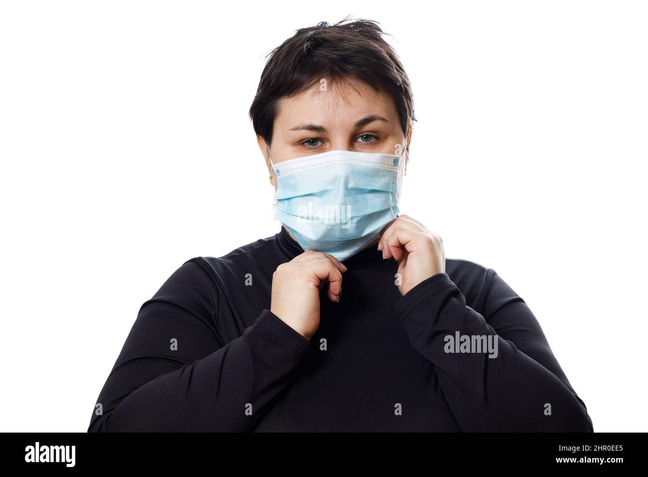 brunette woman with sad eyes in medical mask isolated on white ...