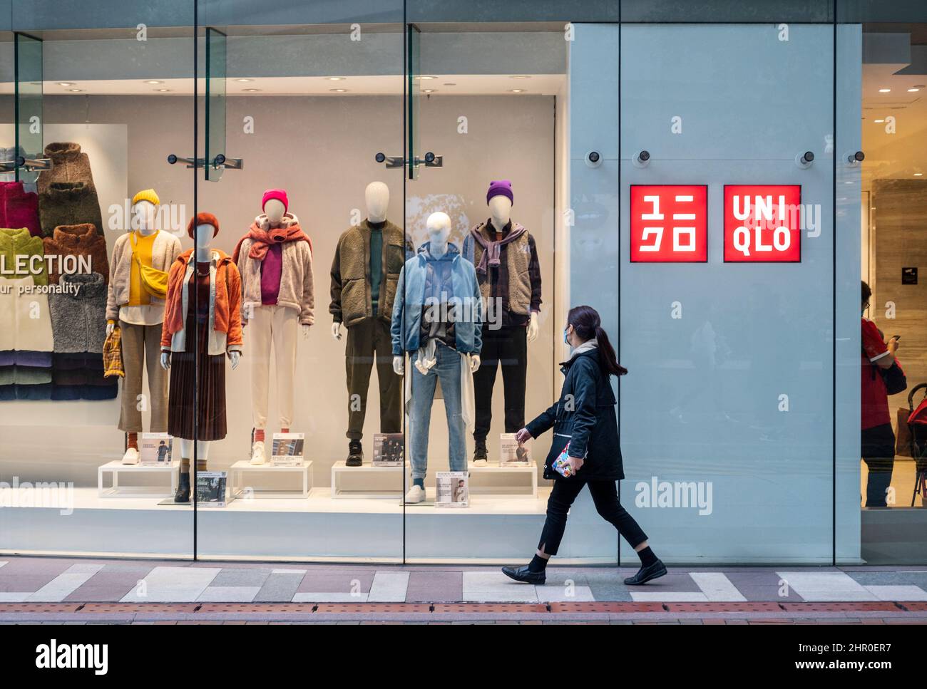 Hong Kong, China. 23rd Feb, 2022. A pedestrian walks past the Japanese