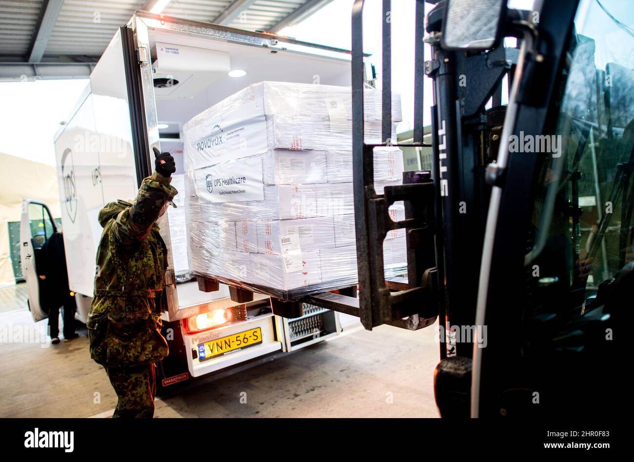 24 February 2022, Lower Saxony, Quakenbrück: The Nuvaxovid vaccine from Novavax is delivered to the premises of the Bundeswehr pharmacy and temporarily stored in refrigerated containers. The barracks in Quakenbrück, Lower Saxony, serve as the central vaccine warehouse in Germany during the Corona crisis. Photo: Hauke-Christian Dittrich/dpa Stock Photo