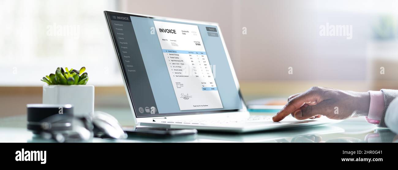 E Invoice Business Management. Accountant Using Electronic Invoice Stock Photo