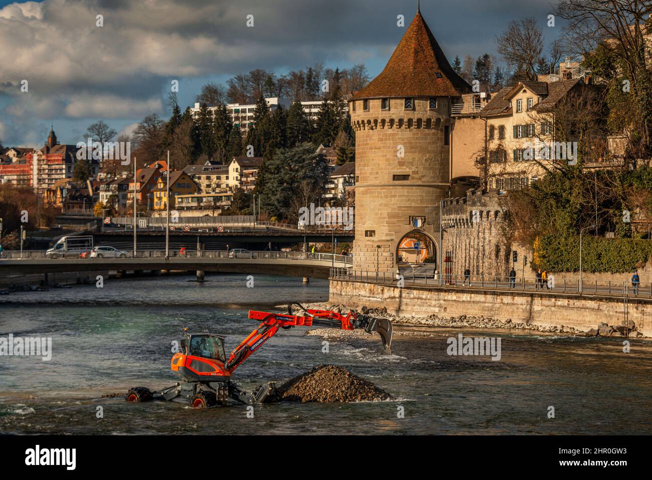 Excavator shovel dredging river, Lucerne, Switzerland Stock Photo