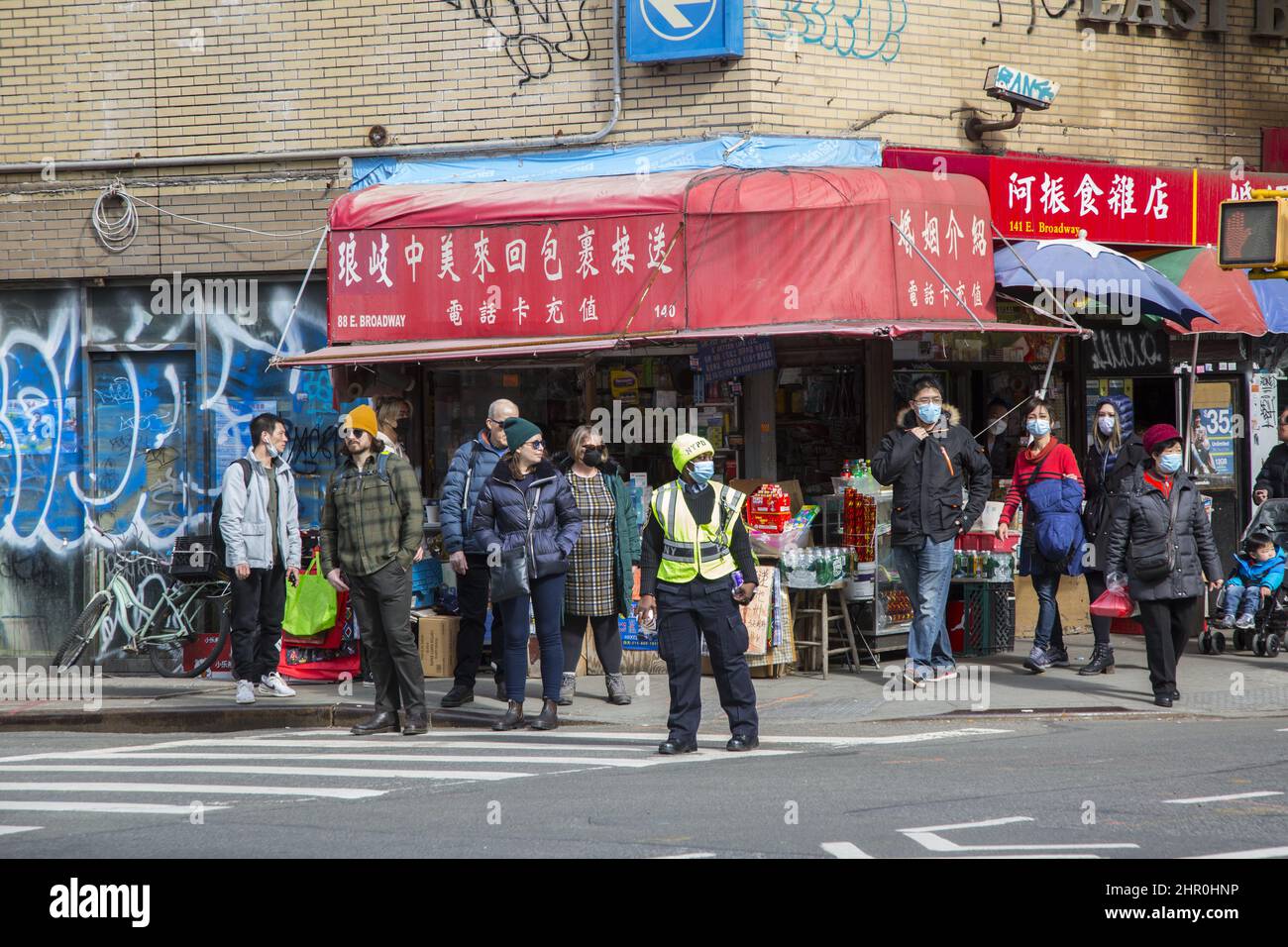People on East Broadway in Chinatown, Manhattan, New York City. Stock Photo