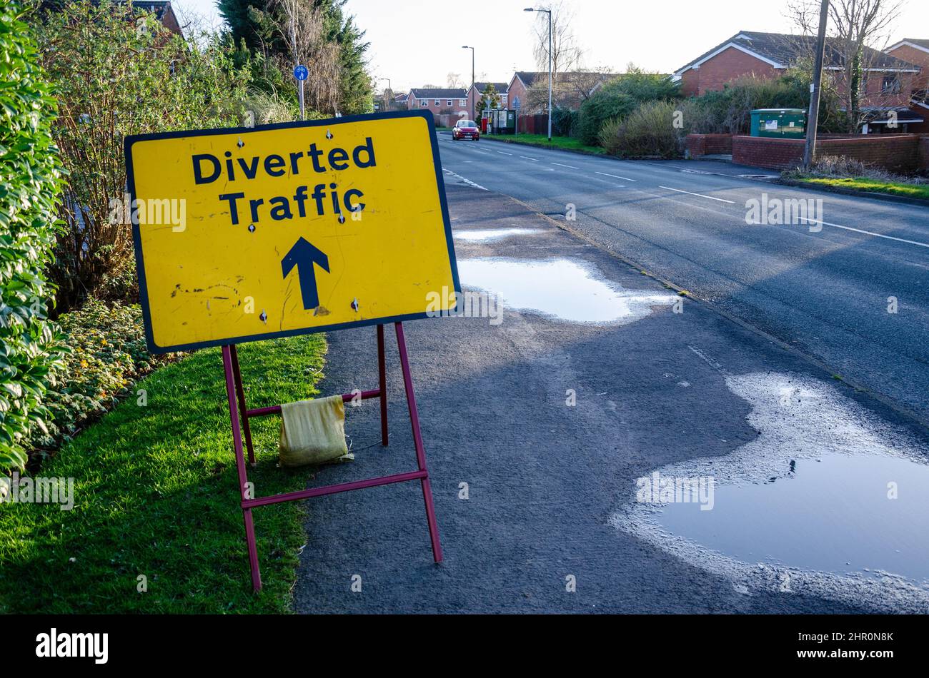 Road signs warning motorists of diverted traffic and road closures due to roadworks. Stock Photo