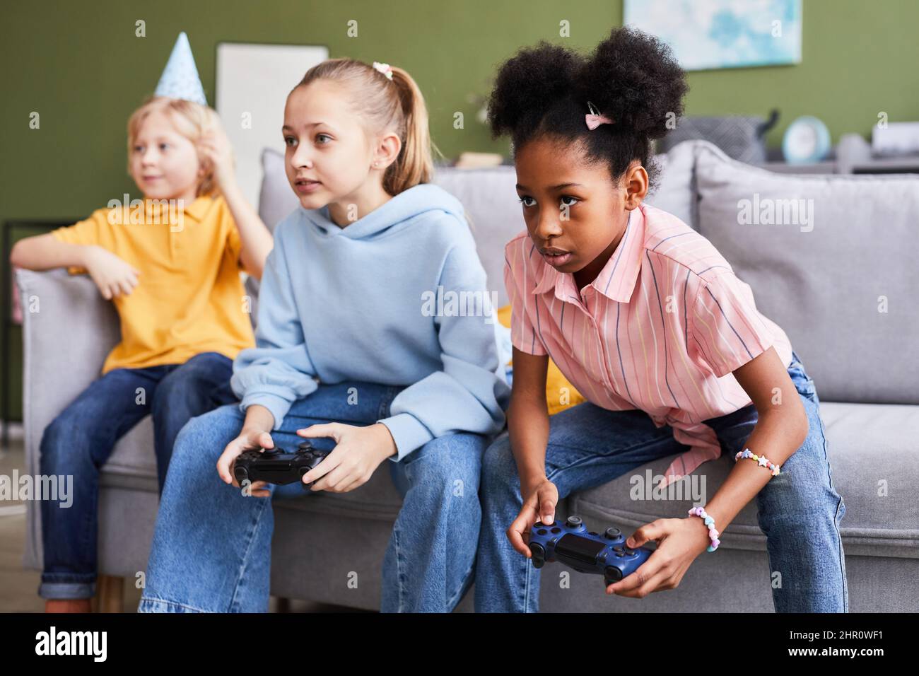 Boy playing a video game - Stock Image - T485/0068 - Science Photo