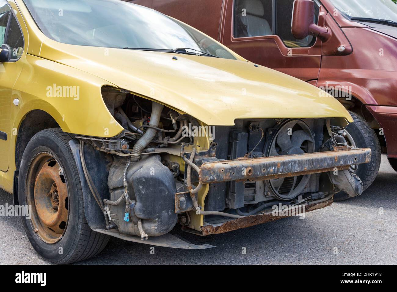 passenger car without headlights and bumper, car repair after a