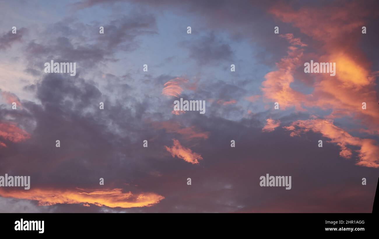 Beautiful background sky with clouds in sunset Stock Photo - Alamy