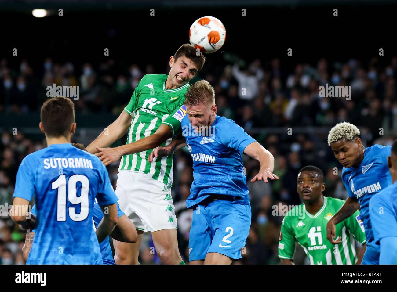Sevilla, Spain. 24th Feb, 2022. SEVILLA, SPAIN - FEBRUARY 24: Edgar Gonzalez of Real Betis in duel with Dmitri Chistyakov of FC Zenit during the UEFA Europa League Knockout Round Play-Offs match between Real Betis and FK Zenit Sint-Petersburg at Estadio Benito Villamarin on February 24, 2022 in Sevilla, Spain (Photo by DAX Images/Orange Pictures) Credit: Orange Pics BV/Alamy Live News Stock Photo