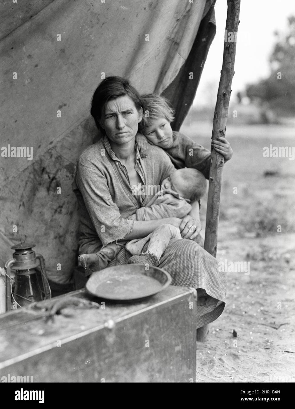 Dorothea Lange Iconic Migrant Mother” came to symbolize the hunger, poverty and hopelessness endured by so many Americans during the Great Depression. Stock Photo