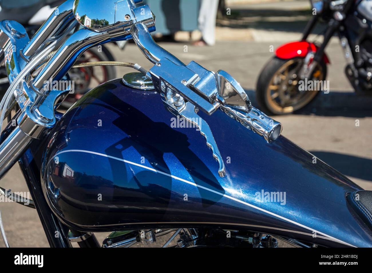 Beautiful top view of a motorcycle, blue motorcycle gas tank, motorcycle steering wheel, Shining chrome, gas handle, Stylish motorcycle look Stock Photo
