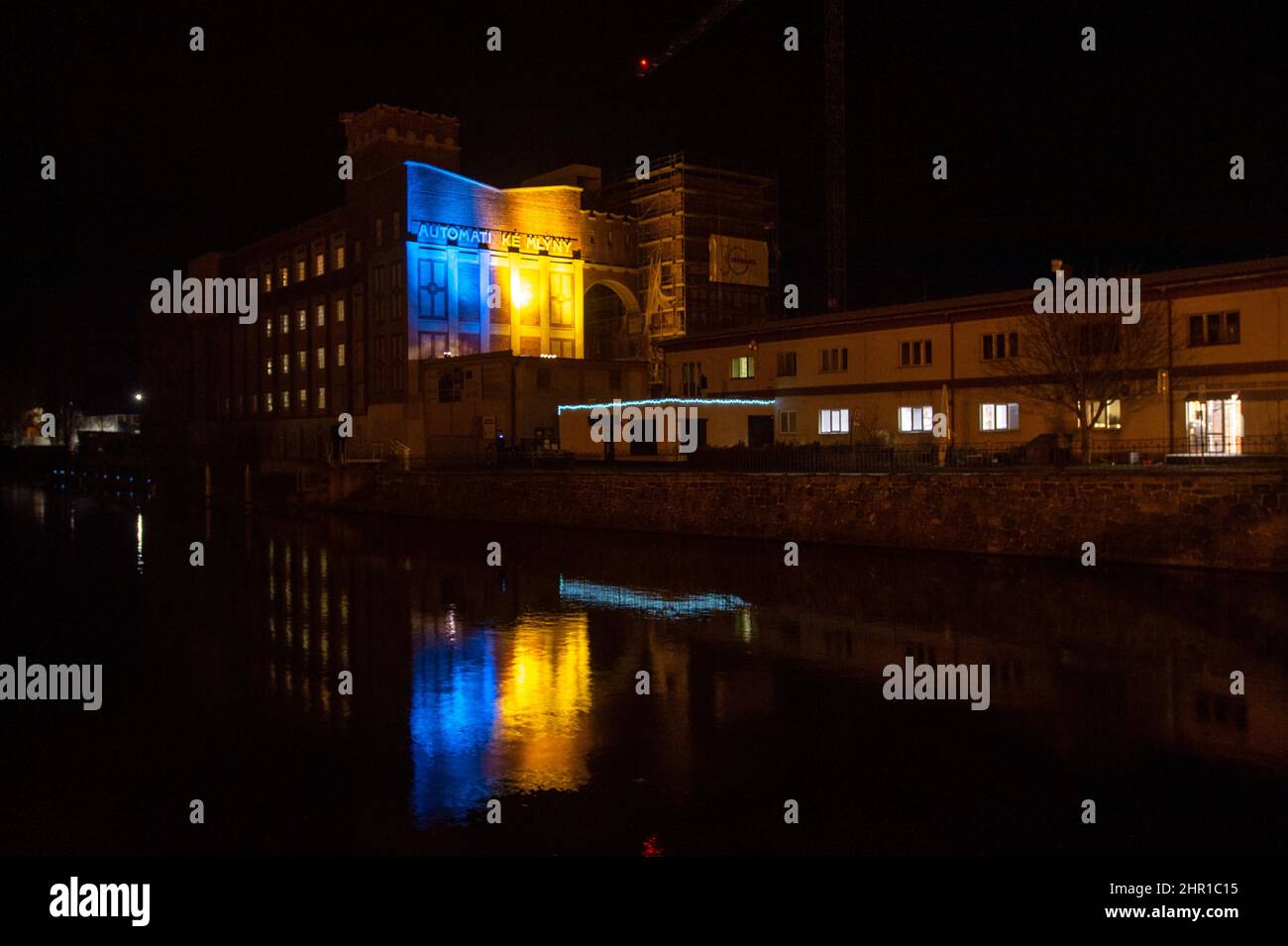 Pardubice, Czech Republic. 24th Feb, 2022. Technical monument the automatic mill in Pardubice, Czech Republic, is illuminated in Ukrainian colours to mark support in the conflict with Russia, Feb. 24, 2022. Credit: Josef Vostarek/CTK Photo/Alamy Live News Stock Photo