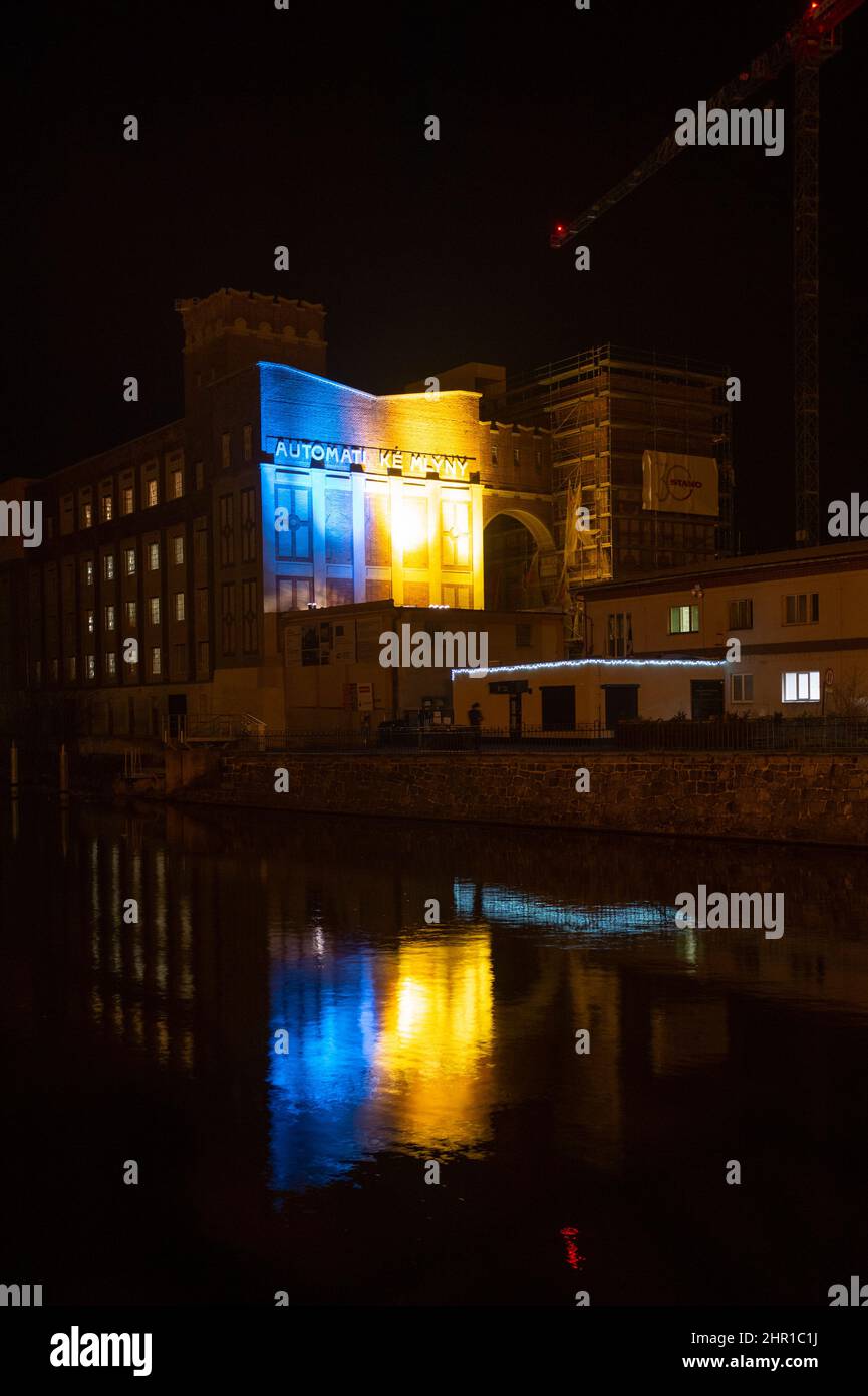 Pardubice, Czech Republic. 24th Feb, 2022. Technical monument the automatic mill in Pardubice, Czech Republic, is illuminated in Ukrainian colours to mark support in the conflict with Russia, Feb. 24, 2022. Credit: Josef Vostarek/CTK Photo/Alamy Live News Stock Photo