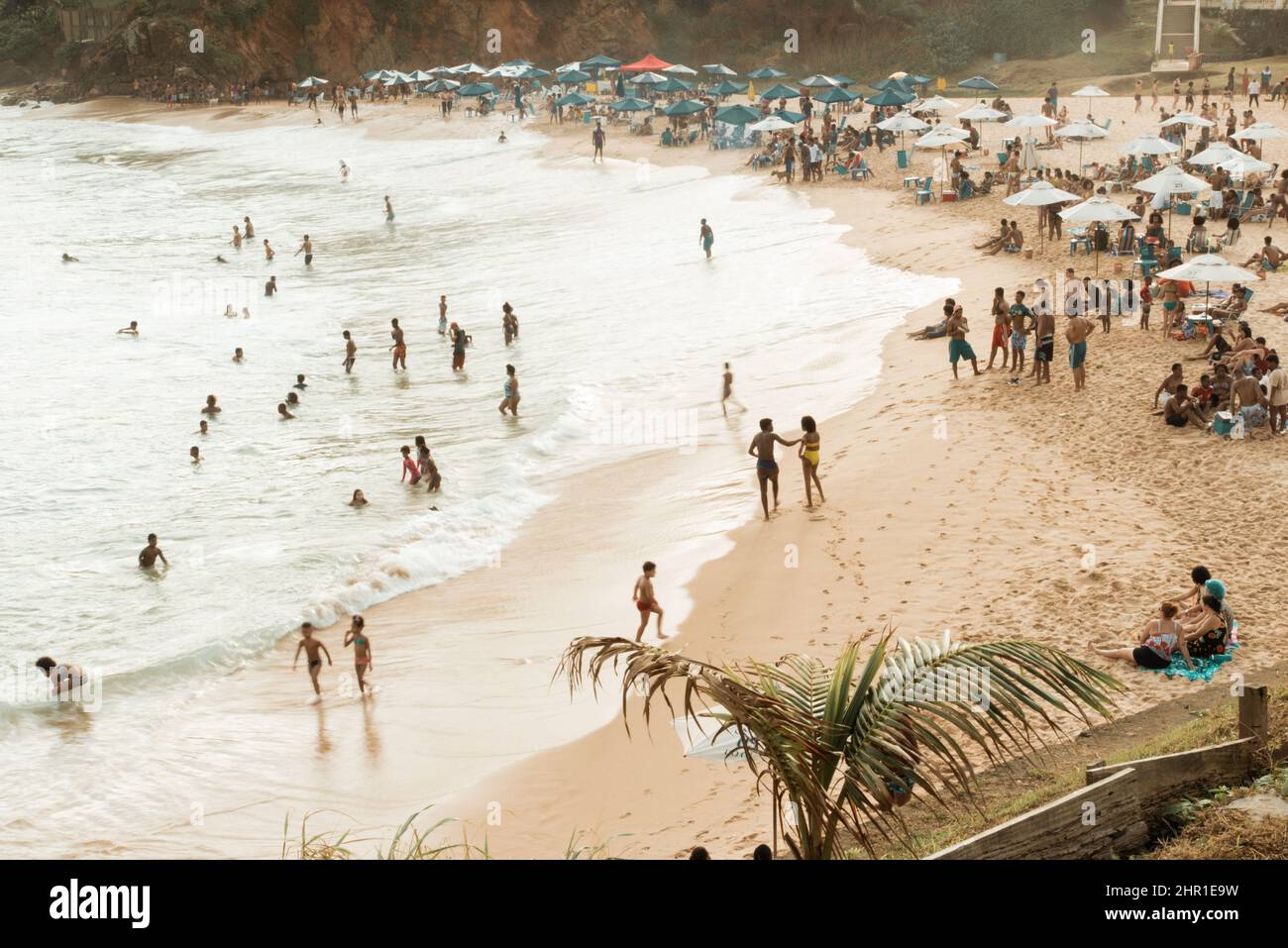 Large group of people on Paciencia beach in the Rio Vermelho neighborhood of Salvador, Brazil. People havin Stock Photo