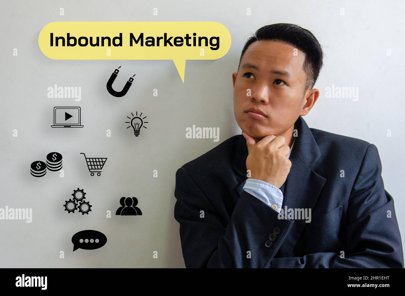 Businessman thinking Inbound marketing icon virtual screen investment analysis for future technology concepts. Stock Photo