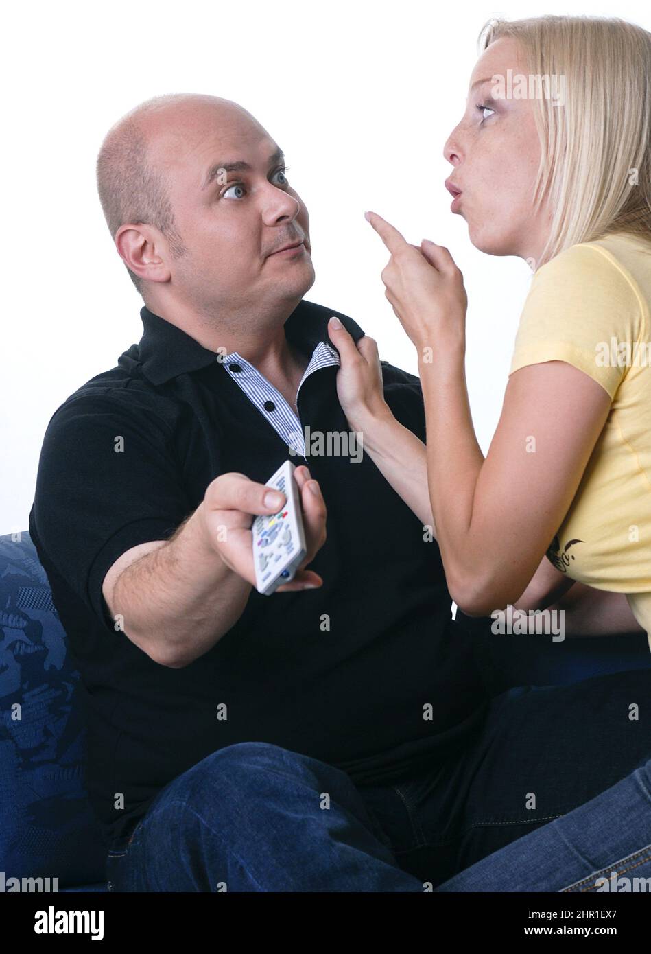 couple argues about the TV program Stock Photo