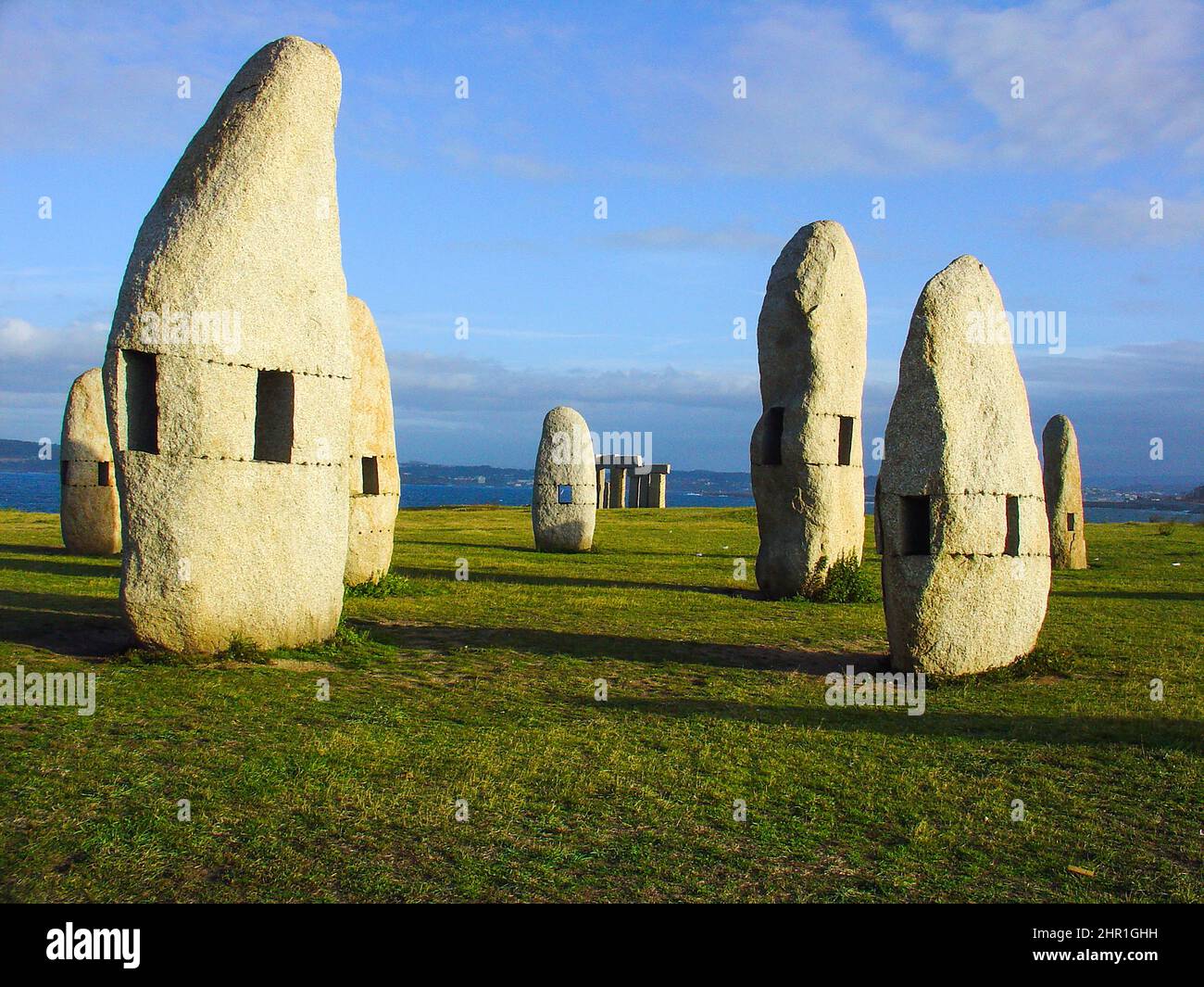 La Coruña menires por la paz. Menhirs for Peace from Manolo Paz sculpture. Each of the menhirs has a small hole in the middle, creating a window to the sea. Stock Photo