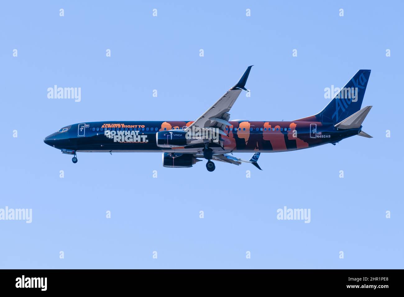 SeaTac, WA, USA - February 23, 2022; Alaska Airlines 737 900 in special livery for diversity and UNCF.  Flight from Las Vegas to Settle. Stock Photo