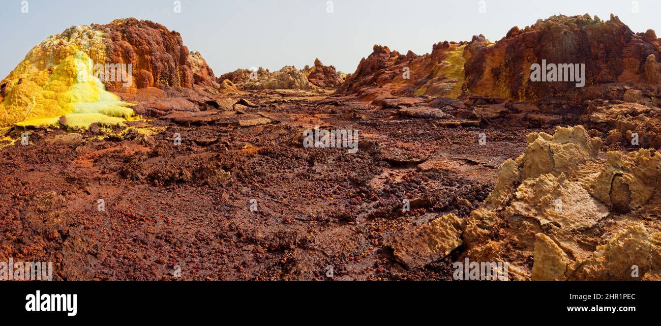 Panorama of surreal colors and Mars like landscape created by Sulphur springs in the hottest place on earth, the Danakil Depression in the Afar Region Stock Photo