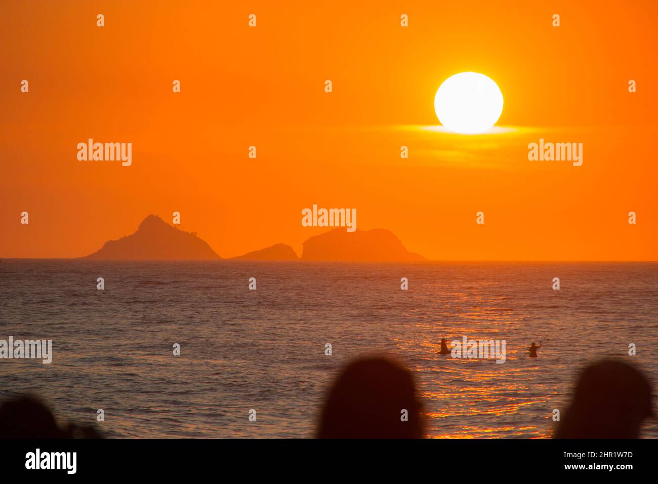 sunset at Arpoador beach in Rio de Janeiro. Stock Photo