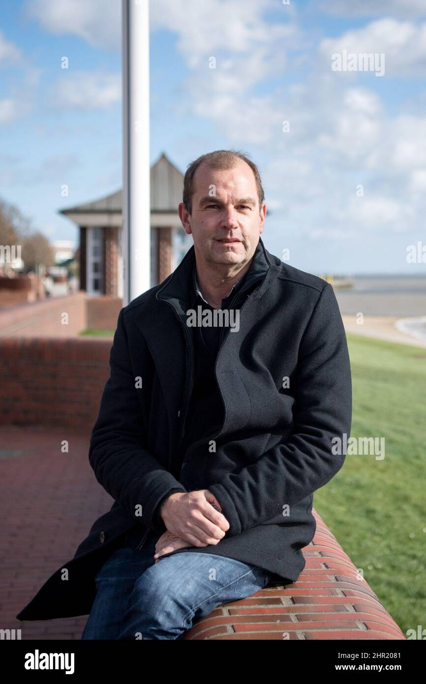 Wilhelmshaven, Germany. 23rd Feb, 2022. Olaf Stamsen, hotelier, stands in front of his hotel on the south beach. (to dpa: 'What those affected say after two years of the Corona pandemic') Credit: Sina Schuldt/dpa/Alamy Live News Stock Photo