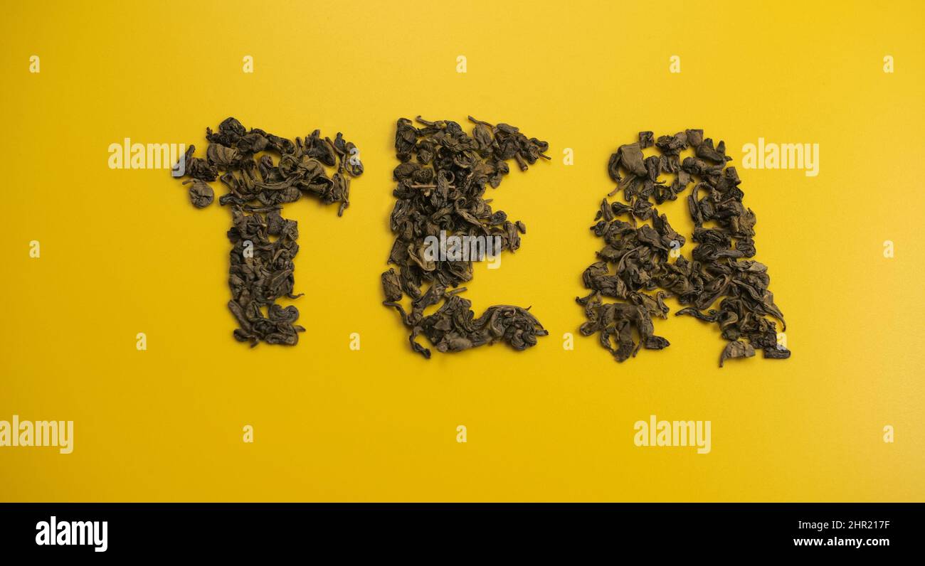 Word tea of dried leaves brewed Stock Photo