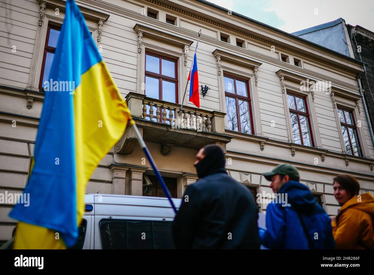 A Russian flag is seen at the building of the Consulate of Russian Federation, surrounded by ukrainian protesters.  Following the beginning of the Rus Stock Photo
