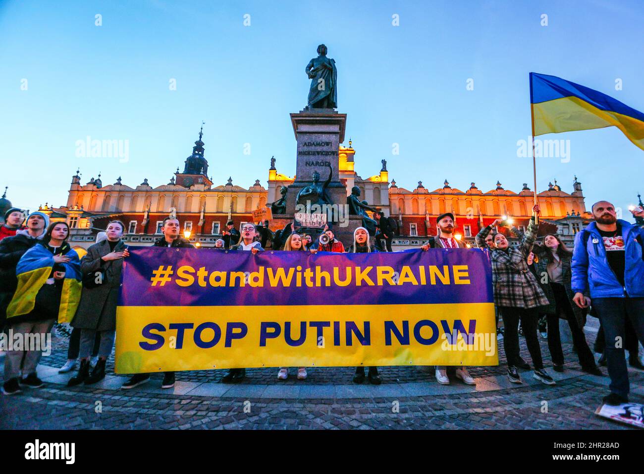Members of Ukrainian community seen holding a banner that reads 'Stand with Ukraine - Stop Putin now'.  Following the beginning of the Russian invasio Stock Photo