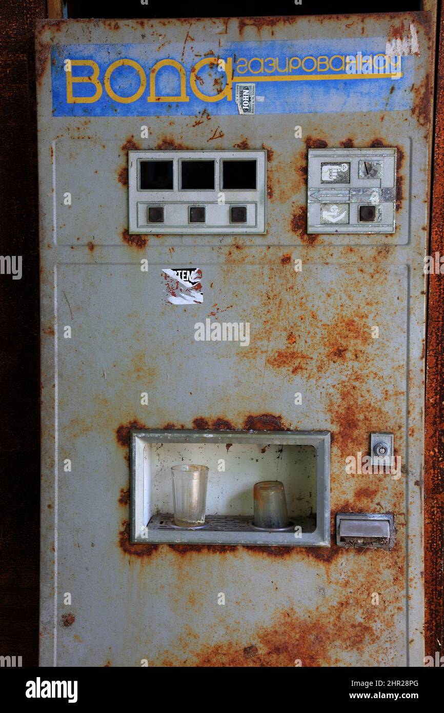 Ukraine, in the restricted and uninhabitable 30 kilometer zone around the Chernobyl power plant and the Pripyat labor camp, vending machine for coffee Stock Photo