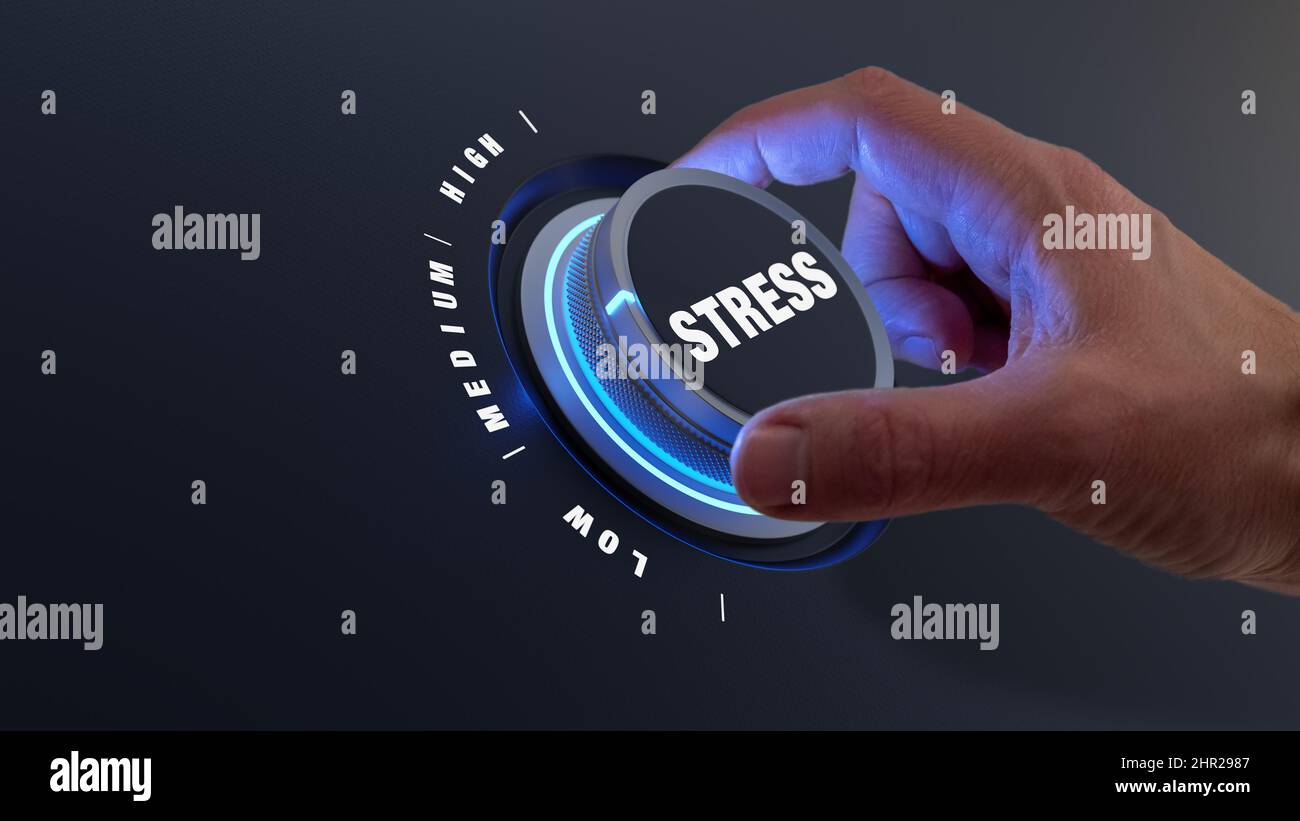 Reduce stress with hand turning knob to lower levels. Burnout, exhaustion, overload, pressure at the workplace and management concept. Relieve tension Stock Photo