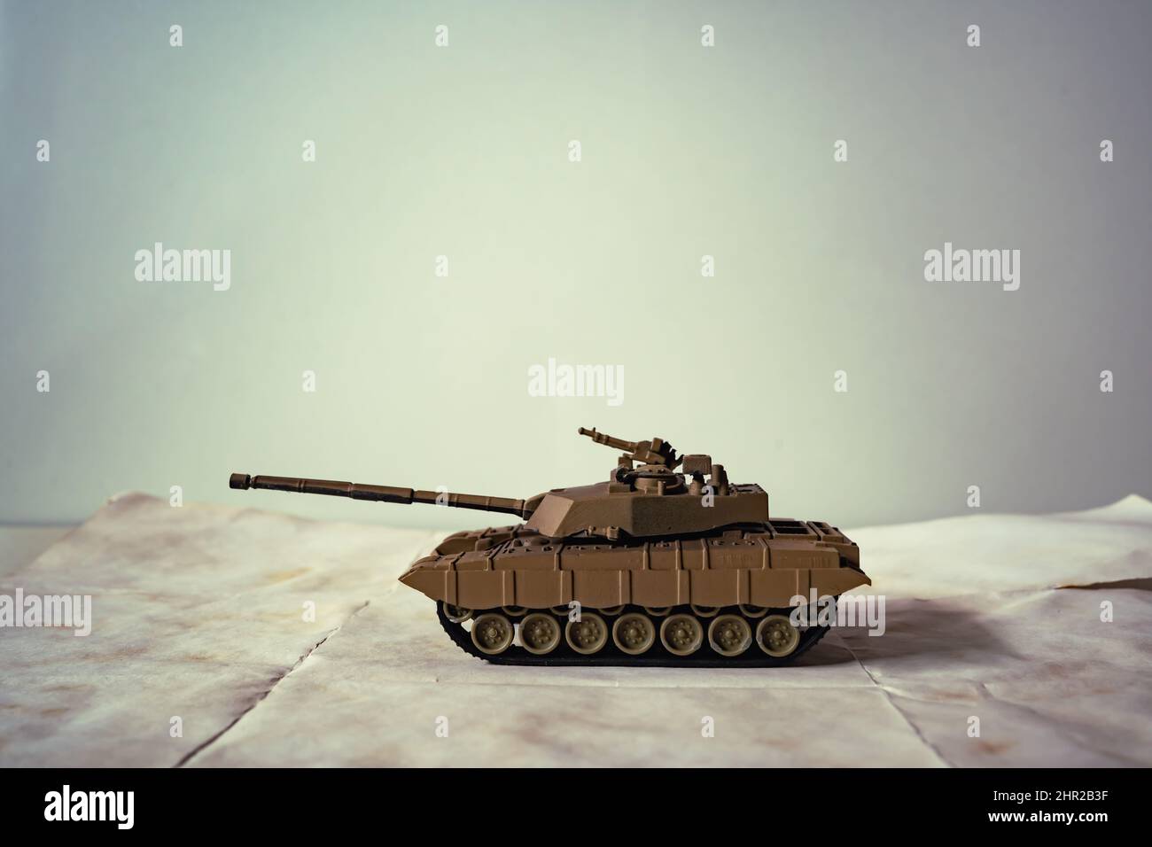 Plastic toy tank with copy space Stock Photo