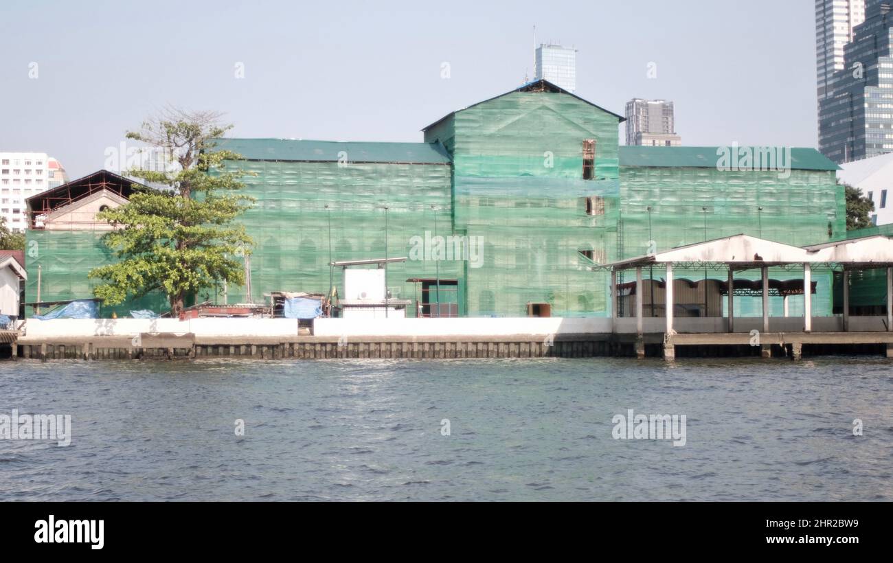 Old Customs House aka Old Firehouse is Undergoing Restorations winter 2022  Chao Phraya River Bangkok Thailand Stock Photo