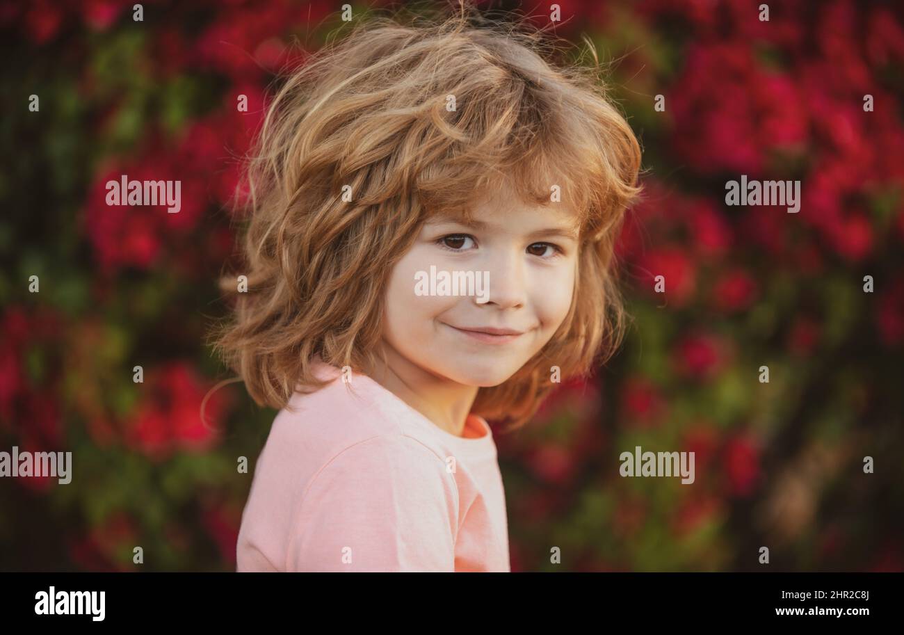 Kid with cute face. Child portrait outdoor Stock Photo - Alamy