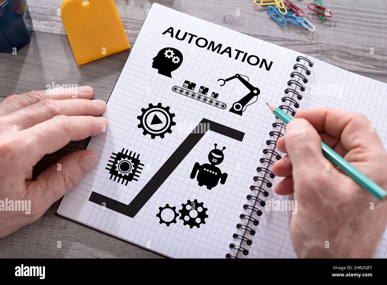Automation concept drawn on a notepad placed on a desk Stock Photo