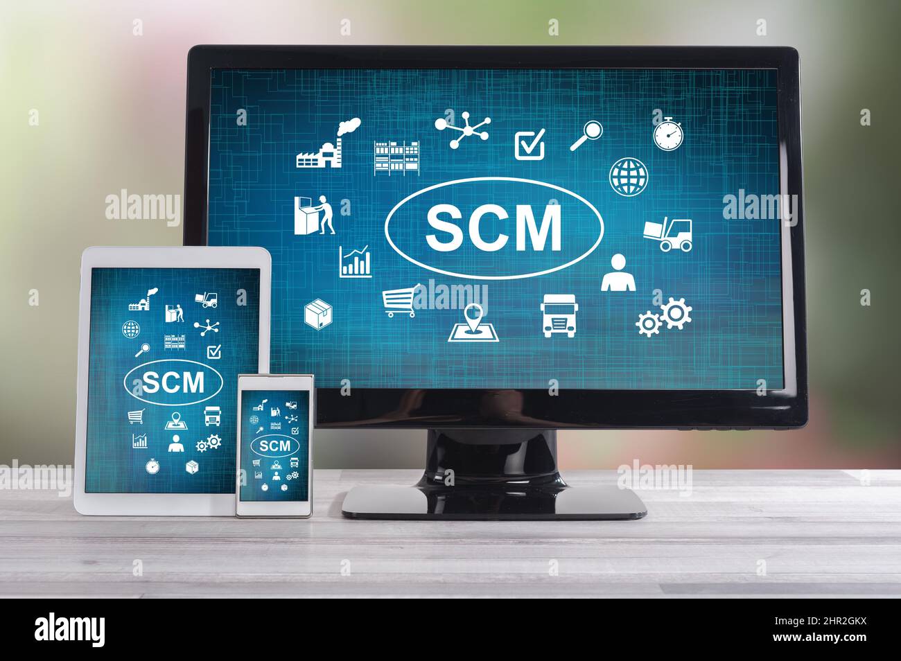 Scm concept shown on different information technology devices Stock Photo