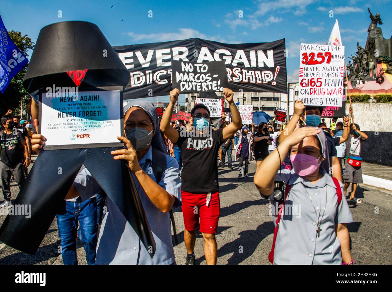 Quezon City, Philippines. 24th Feb, 2022. Militant groups today marked the 36th anniversary of EDSA people power revolution in the history of the overthrow of the Marcos dictatorship. (Photo by Edd Castro/Pacific Press) Credit: Pacific Press Media Production Corp./Alamy Live News Stock Photo