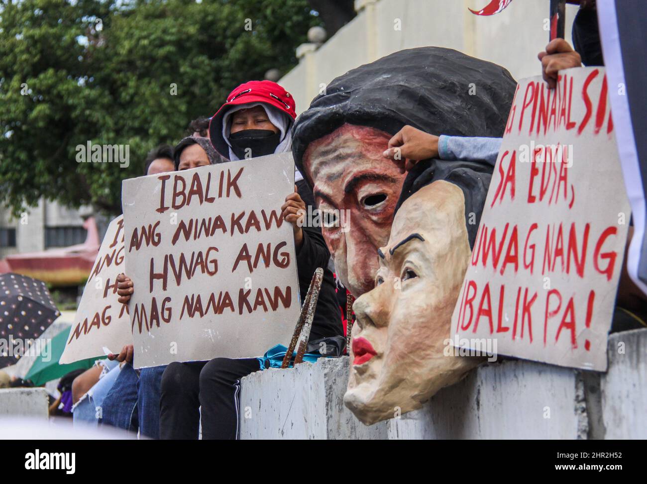 Quezon City, Philippines. 25th Feb, 2022. Militant groups today marked the 36th anniversary of EDSA people power revolution in the history of the overthrow of the Marcos dictatorship. (Photo by Edd Castro/Pacific Press) Credit: Pacific Press Media Production Corp./Alamy Live News Stock Photo