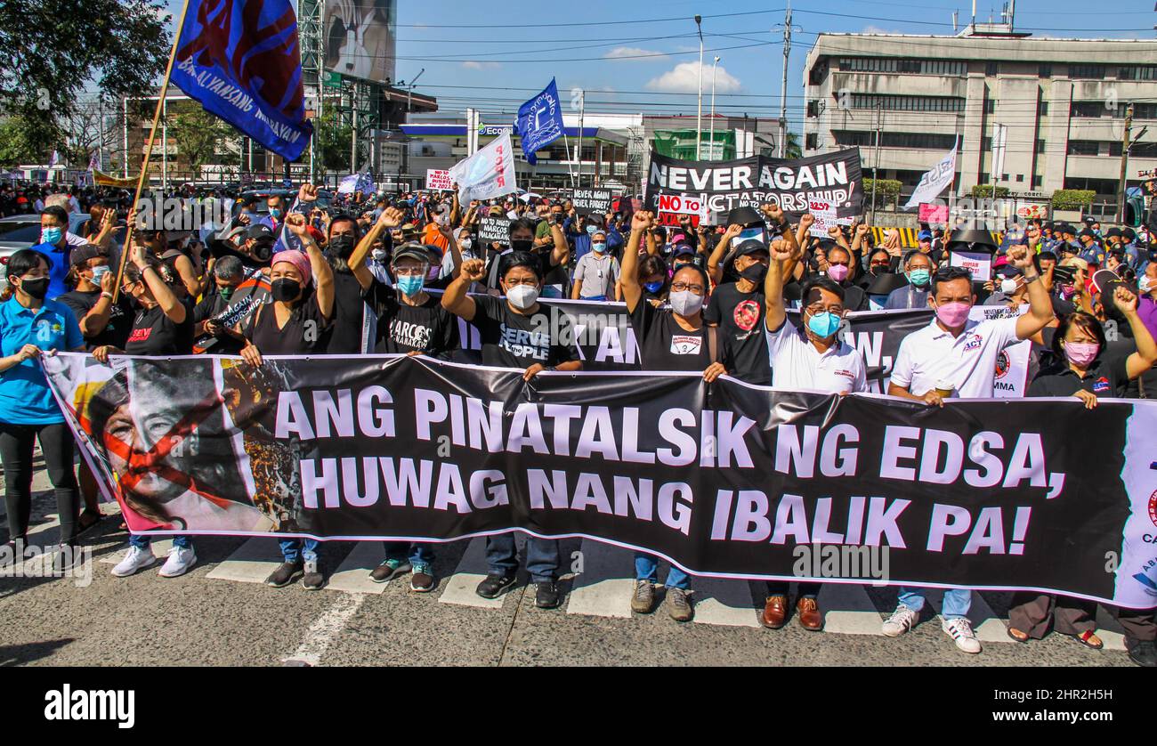 Quezon City, Philippines. 25th Feb, 2022. Militant groups today marked the 36th anniversary of EDSA people power revolution in the history of the overthrow of the Marcos dictatorship. (Photo by Edd Castro/Pacific Press) Credit: Pacific Press Media Production Corp./Alamy Live News Stock Photo
