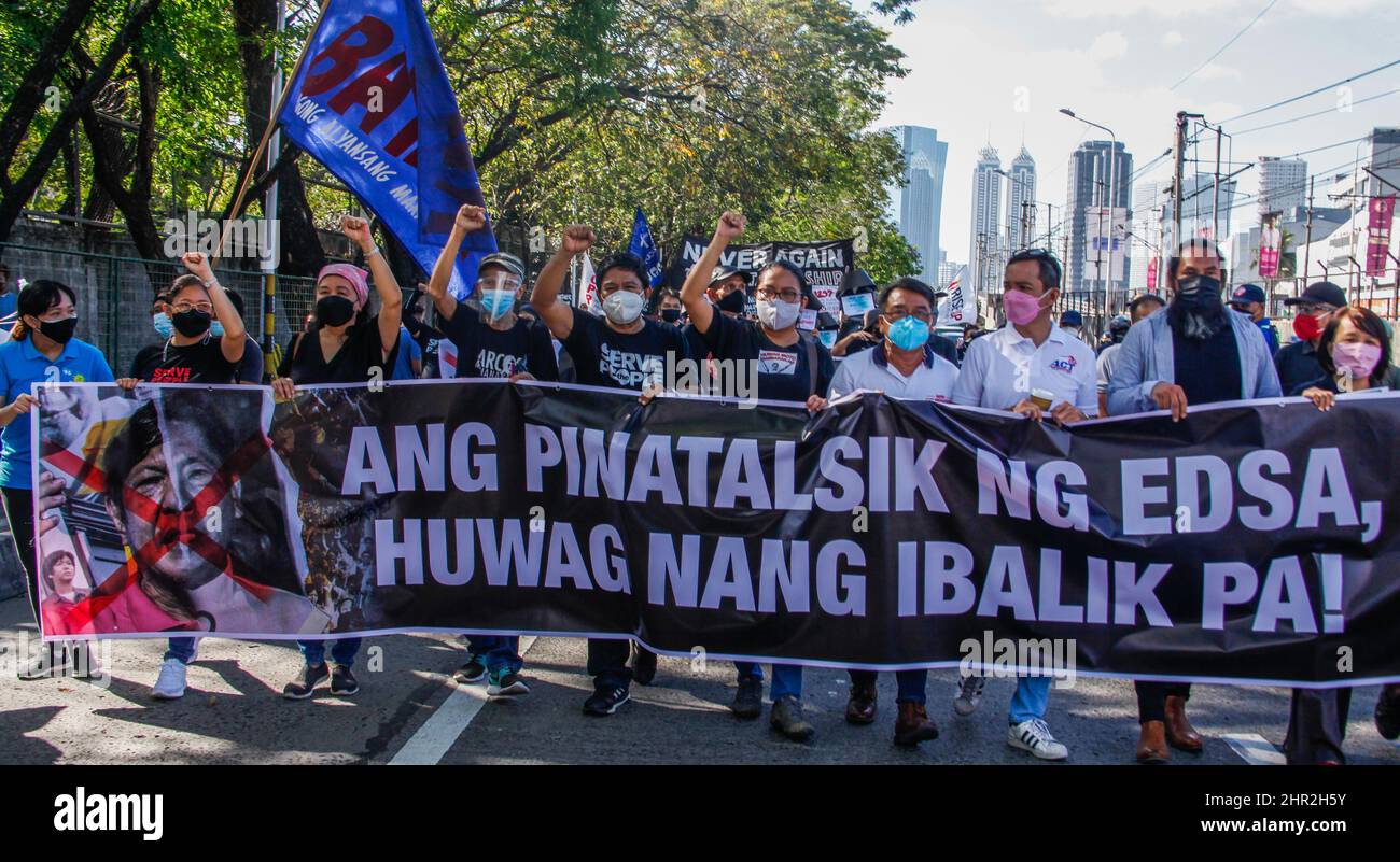 Quezon City, Philippines. 24th Feb, 2022. Militant groups today marked the 36th anniversary of EDSA people power revolution in the history of the overthrow of the Marcos dictatorship. (Photo by Edd Castro/Pacific Press) Credit: Pacific Press Media Production Corp./Alamy Live News Stock Photo