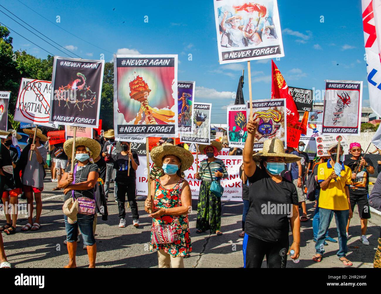 Quezon City, Philippines. 24th Feb, 2022. Militant groups today marked the 36th anniversary of EDSA people power revolution in the history of the overthrow of the Marcos dictatorship. (Photo by Edd Castro/Pacific Press) Credit: Pacific Press Media Production Corp./Alamy Live News Stock Photo