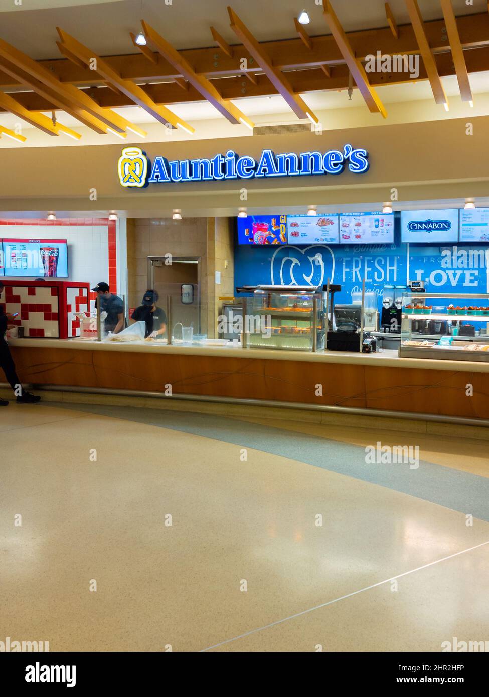 Orlando, Florida - February 4, 2022: Wide View of Auntie Anne's Shop inside Terminal B of Orlando International Airport Stock Photo