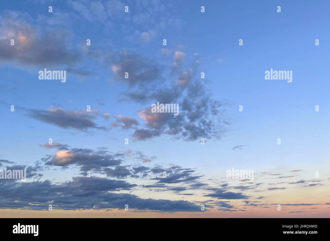 Blue sky background with clouds Stock Photo - Alamy