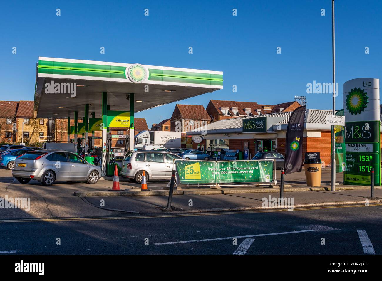 Southend on Sea, Essex, UK. 25th Feb, 2022. The risk of rising fuel prices due to the situation in Ukraine has caused people to queue at petrol stations to fill up in the UK. The fuel prices at a BP garage in Southend on Sea have increased to a very high price per litre Stock Photo
